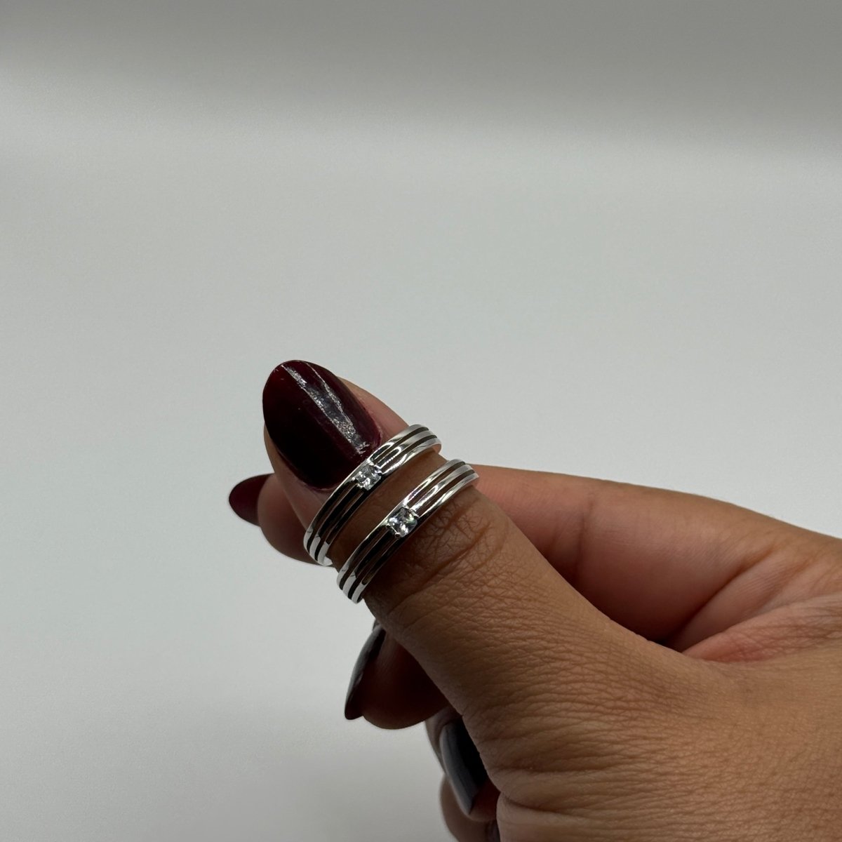 Theryn Ring – Striped Elegance with Zirconia Accent - CouplesPicks